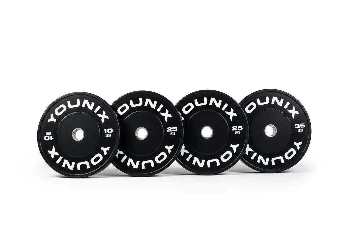 Younix Premium Bumper Set 100 kg Hantelscheiben-Set, vier schwarze Scheiben in einer Reihe auf Weiß