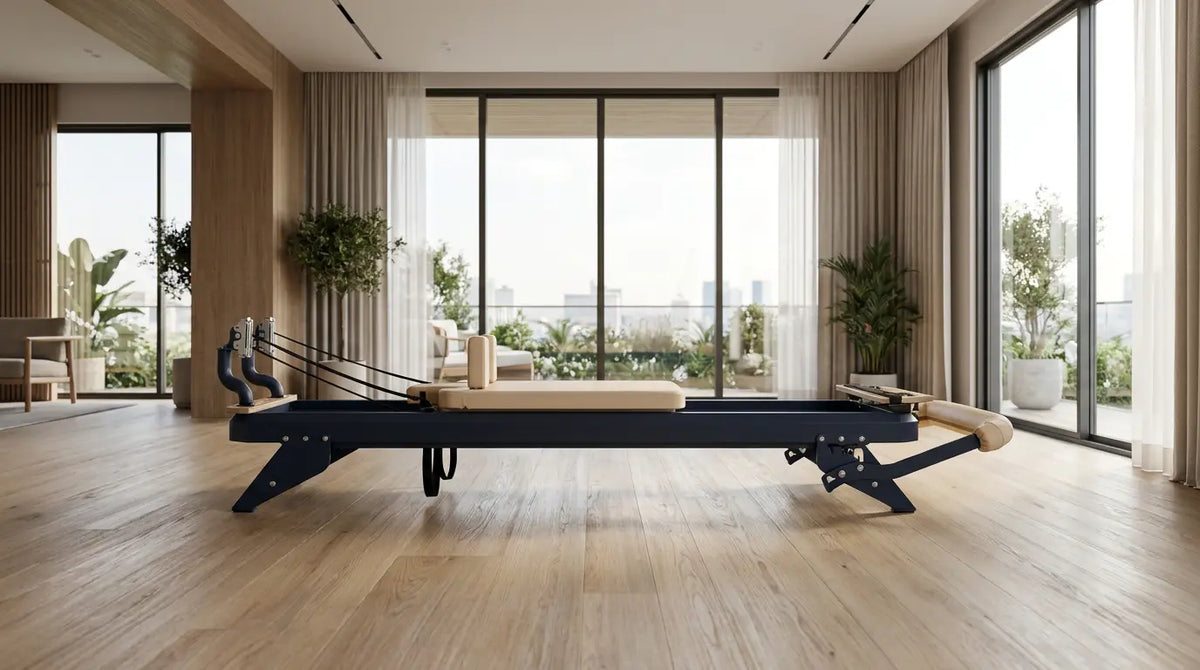 Hegren TALMA 62 Pilates Reformer with a steel frame and spring system in a bright studio