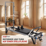 Elina Pilates HL3 Reformer mit Tower aus Aluminium in einem hellen Pilates-Studio mit Holz und Leinen