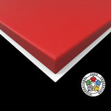 SportCom Judo-Tatami Reisstroh 1 × 1 m, 5 cm, rutschfeste Unterseite, Eckdetail in Rot vor schwarzem Hintergrund