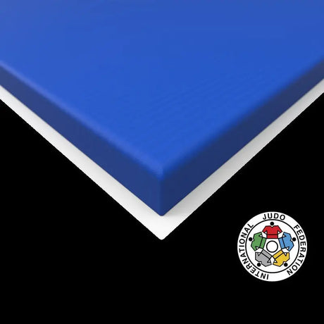 SportCom Judo-Tatami Reisstroh 2 × 1 m, 5 cm, glatte Unterseite, Detail der blauen Kante mit weißer Unterseite