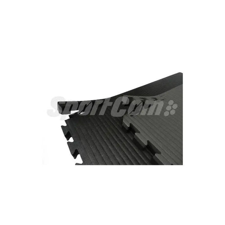 SportCom Puzzlematten 2 cm in Schwarz, Detail der Steckverbindung zweier Matten mit Rillen