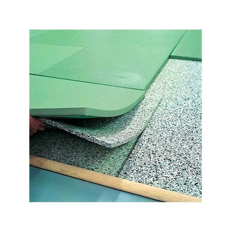 SportCom Schaumstoffunterlage für Tatami 3 cm: Detail der gesprenkelten Unterlage unter grünen Tatami-Matten
