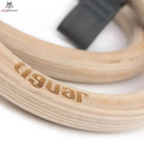 tiguar Alfa Turnringe Gurtringe mit Gummigriff, Detail des eingravierten Logos auf dem Holzring