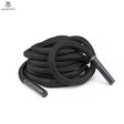 tiguar Battle Rope V2 Trainingsseil in Schwarz, aufgerollt mit beiden Griffenden, Schrägansicht