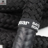 tiguar Battle Rope V2 Trainingsseil, Detail des gummierten Griffendes mit Logo-Banderole