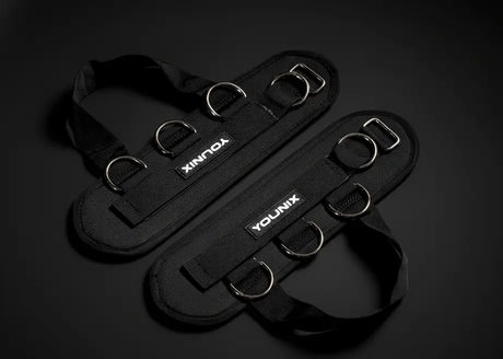 Younix Ankle Cuffs Fußmanschetten für den Kabelzug, Paar in Draufsicht vor schwarzem Hintergrund