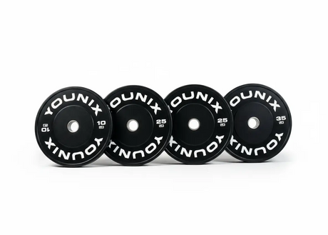 Younix Bumper Bundle 140 kg Langhantel-Set, vier Bumper Plates nebeneinander vor weißem Hintergrund