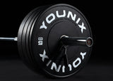 Younix Olympic Pro Barbell 20 kg Olympia-Langhantel, Detail der Hülse mit Bumper Plate